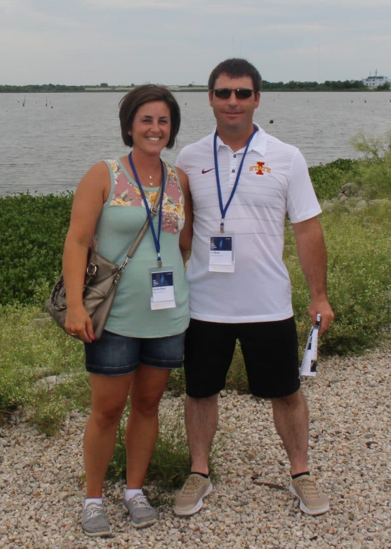 Kellie Blair and husband AJ Blair, owner and operator of Blair Farm LLC, IAWA Advisory Council Member, both One Water delegates. Picture taken in New Orleans, Louisiana. Bay in the background.