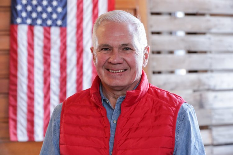 Man With Flag Help Miller Creek Watershed Improve Quality