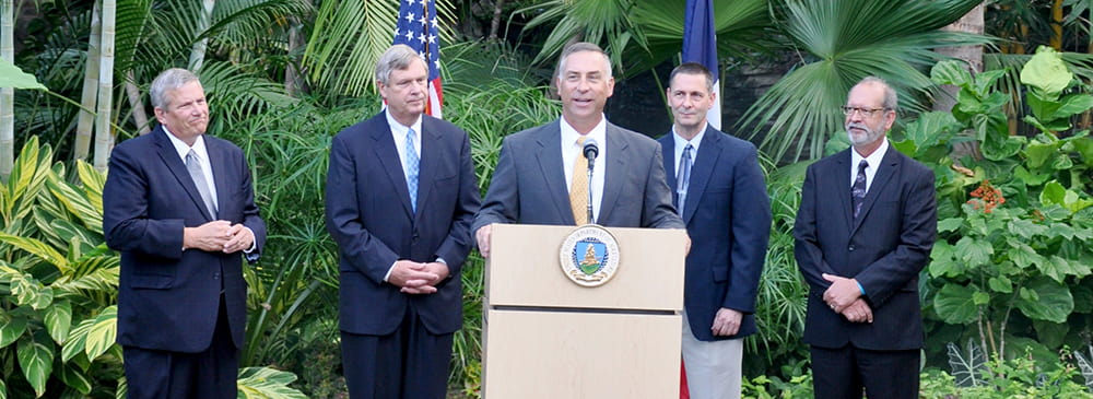 U.S. Secretary of Agriculture Tom Vilsack introduces Iowa’s new State Conservationist, Kurt Simon at the Des Moines Botanical Center in October. Others congratulating Simon are Iowa Sec. of Ag., Bill Northey, Interim State Conservationist Rick Ellsmore and Deputy Director of the Iowa Department of Natural Resources, Bruce Trautman. 