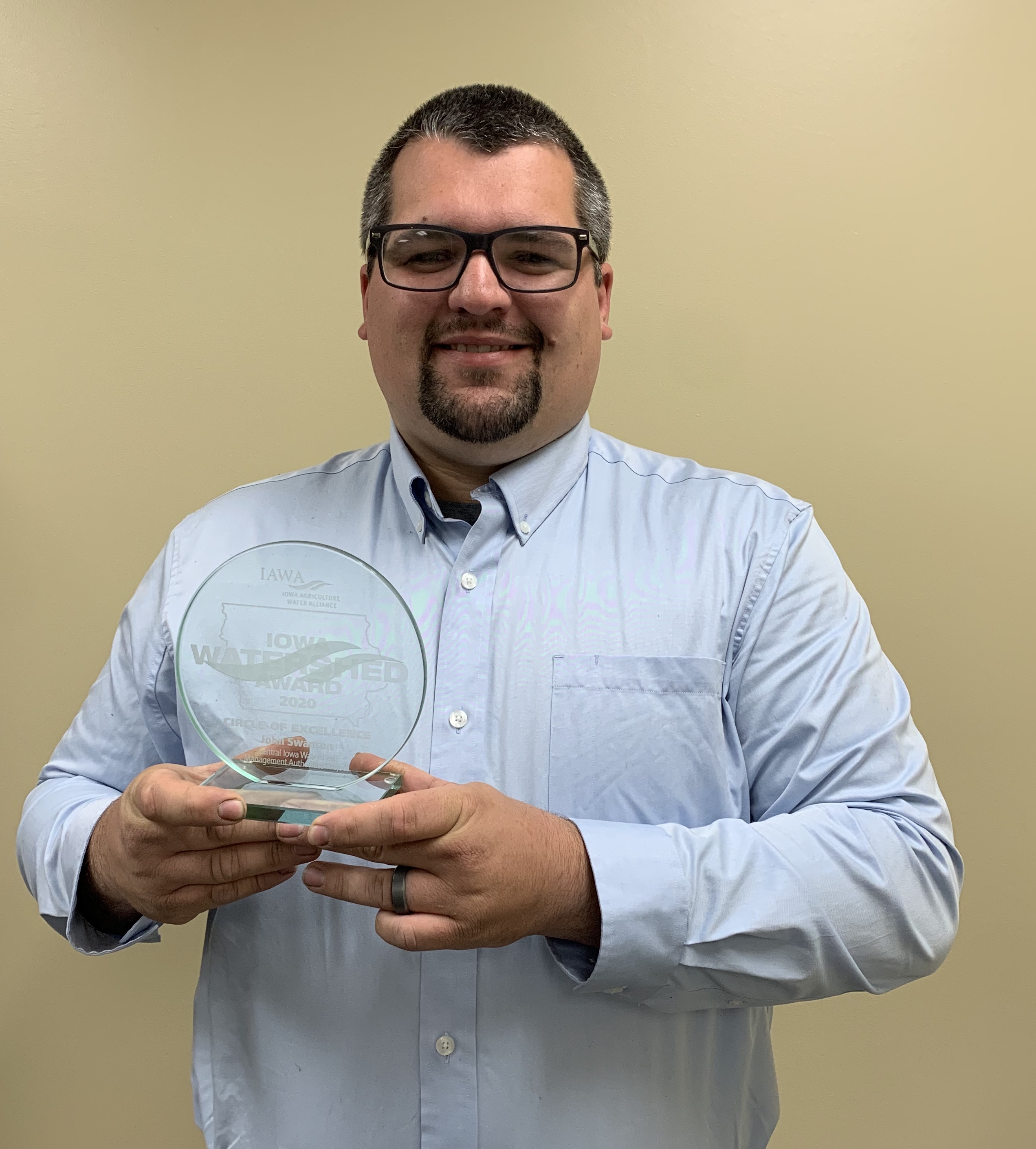 John Swanson with IAWA Circle of Excellence Award.