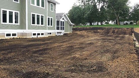 Compost integrated with the back yard.